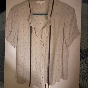 Light pink blouse with flower pattern